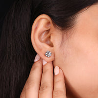 Round diamond earrings in a classic push back earrings style for effortless wear.
