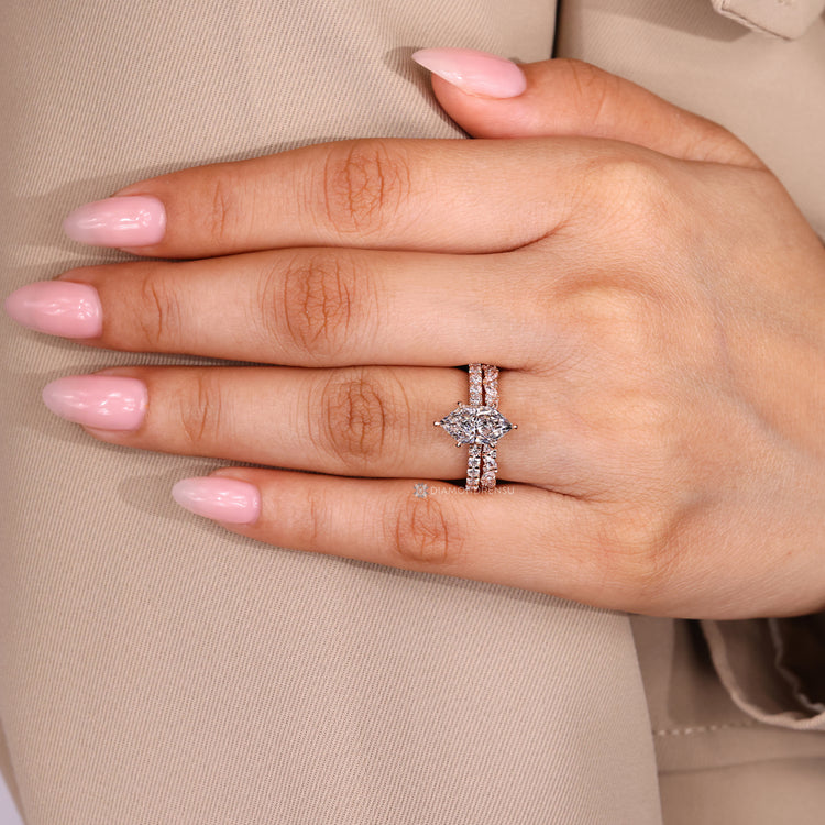 Round diamond Dutch marquise ring with cathedral setting