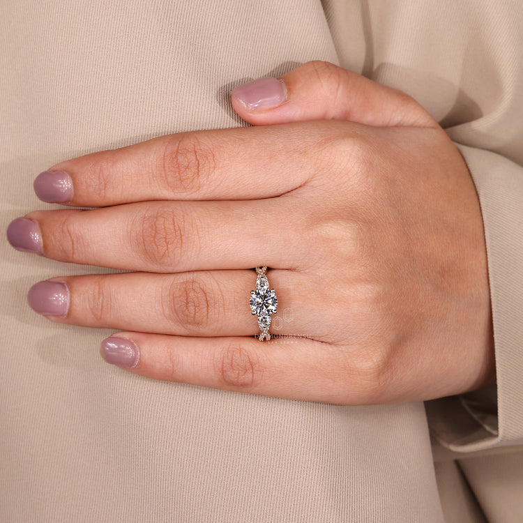 Diamondrensu handmade round cut engagement ring with twisted shank.
