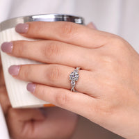 IGI certified round cut engagement ring with 4 prong setting.
