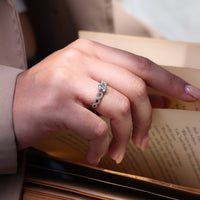 Customized ring design with a twisted diamond band.
