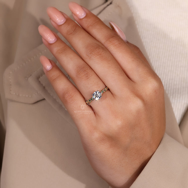 Handmade Jewelry featuring a two-tone diamond ring with a round cut and four prong setting.
