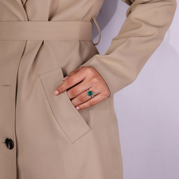 Buy engagement ring with emerald birthstone and round diamond pave.
