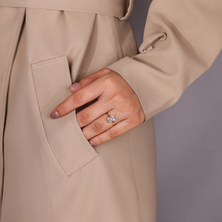 Buy engagement ring featuring radiant cut diamond and round hidden halo.
