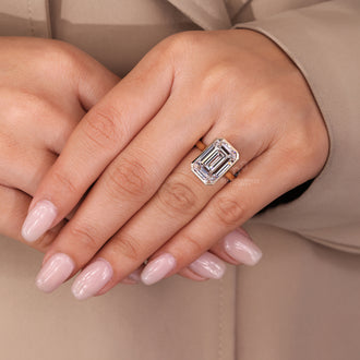 Buy engagement ring with emerald cut diamond.
