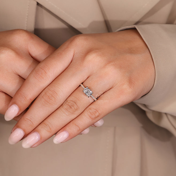 Hidden halo engagement ring with a pave setting and IGI certified diamond.
