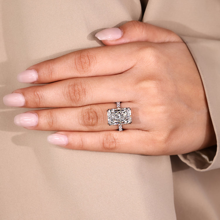 Custom diamond ring with radiant lab diamond.
