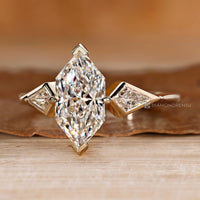 Dutch marquise diamond ring with a two V prong setting.