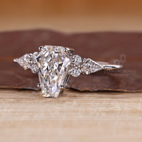 Diamondrensu coffin ring with lab grown diamond center.