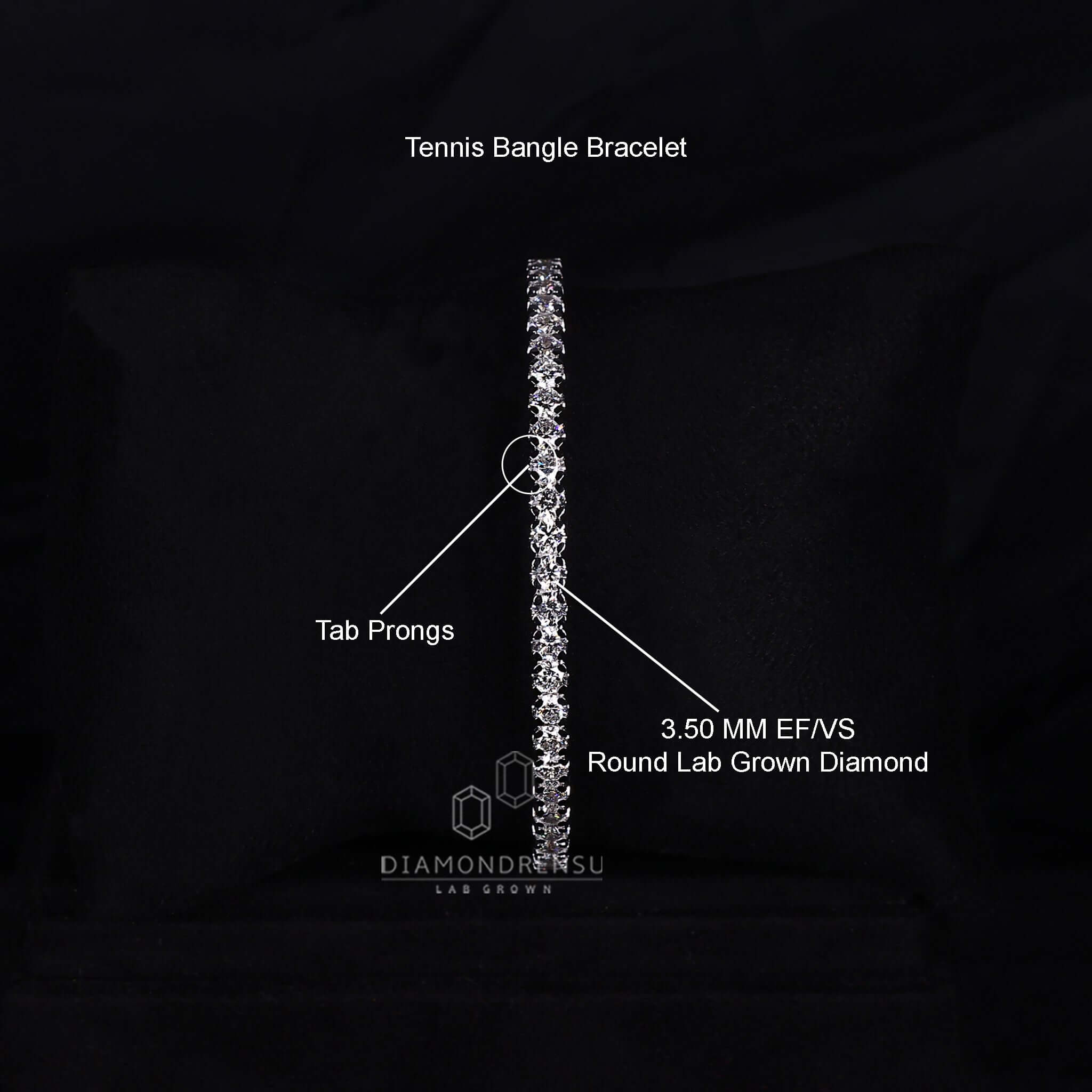 Detailed view of tab prongs on a round diamond bangle bracelet
