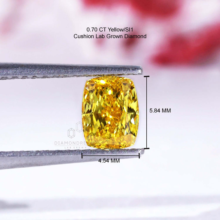 Lab grown diamond loose elongated cushion yellow stone.

