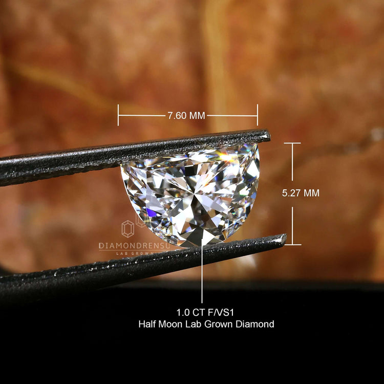 Buy loose diamond in half moon cut design.