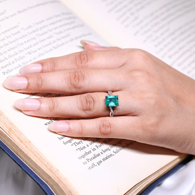 Green Emerald Birthstone Ring with twisted Shank Pave Setting