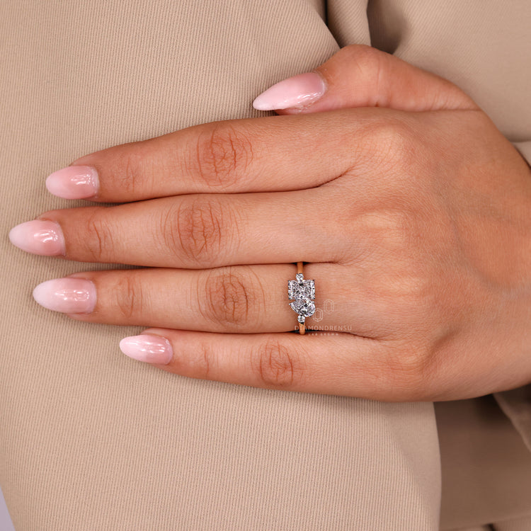 Two stone engagement ring with lab grown diamonds and claw prong setting.