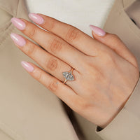 Solitaire style marquise diamond ring.
