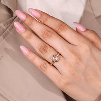 Cushion rose cut engagement ring with tapered shank.