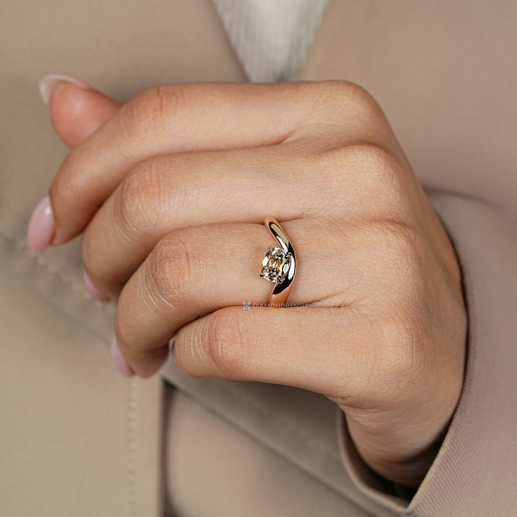 Lab grown diamond completes this handmade ring.