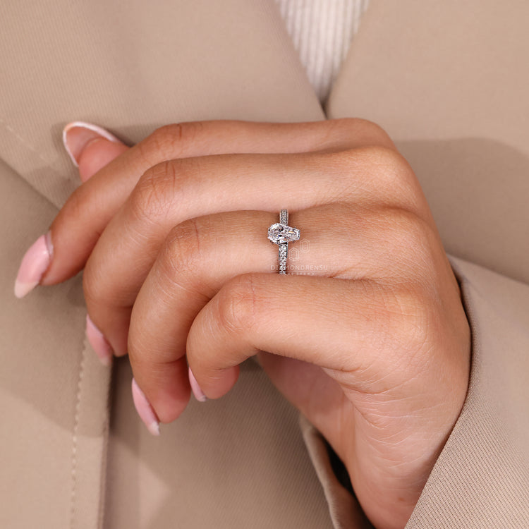 Handmade coffin ring with heart shape prongs and pave band.