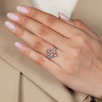 Handmade pink marquise diamond ring with cluster setting.