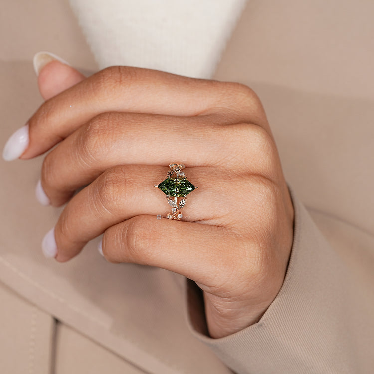 Dutch marquise engagement ring with six leaf style prongs.