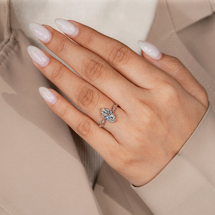 IGI certified lab grown marquise diamond engagement ring.
