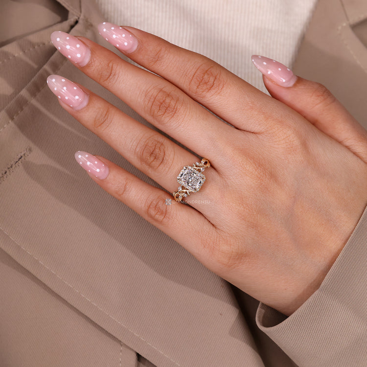 Nature inspired engagement ring with cathedral setting and halo design.
