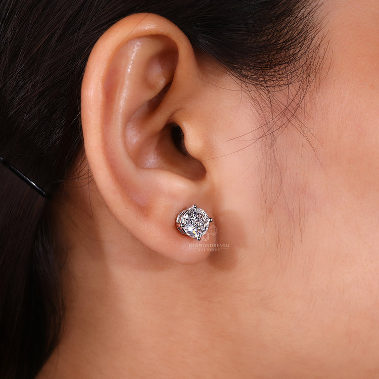 Portuguese cut lab diamond earrings with screw back closures.