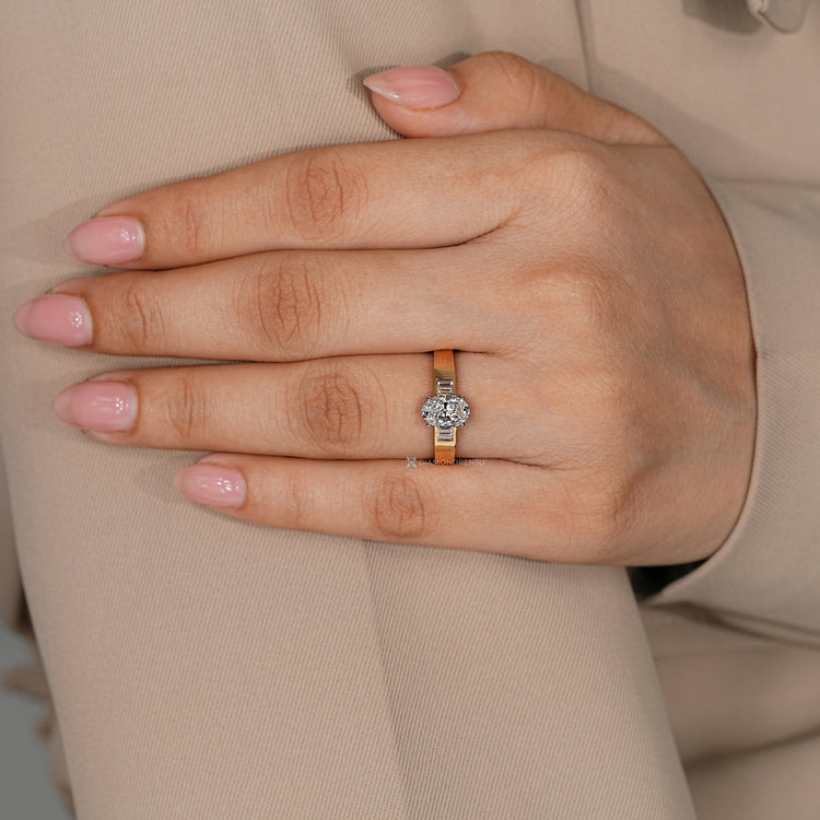Handmade two tone oval diamond ring with baguette stones.
