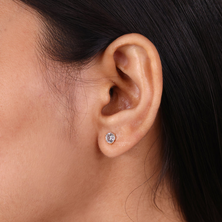Lab grown Portuguese diamond earrings with classic stud style.