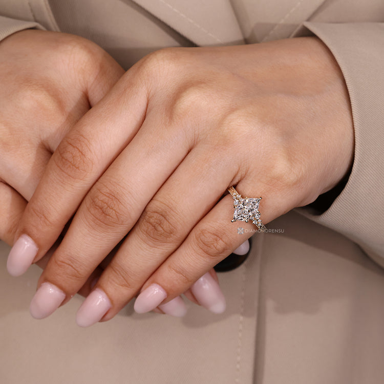 Lab grown diamond ring with cluster setting and round side stones.