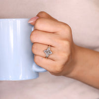 Handmade marquise engagement ring with six claw prong setting.