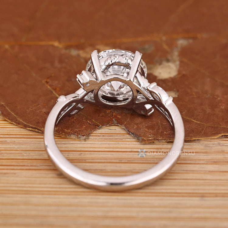 IGI certified lab grown diamond with four leaf style prong setting.