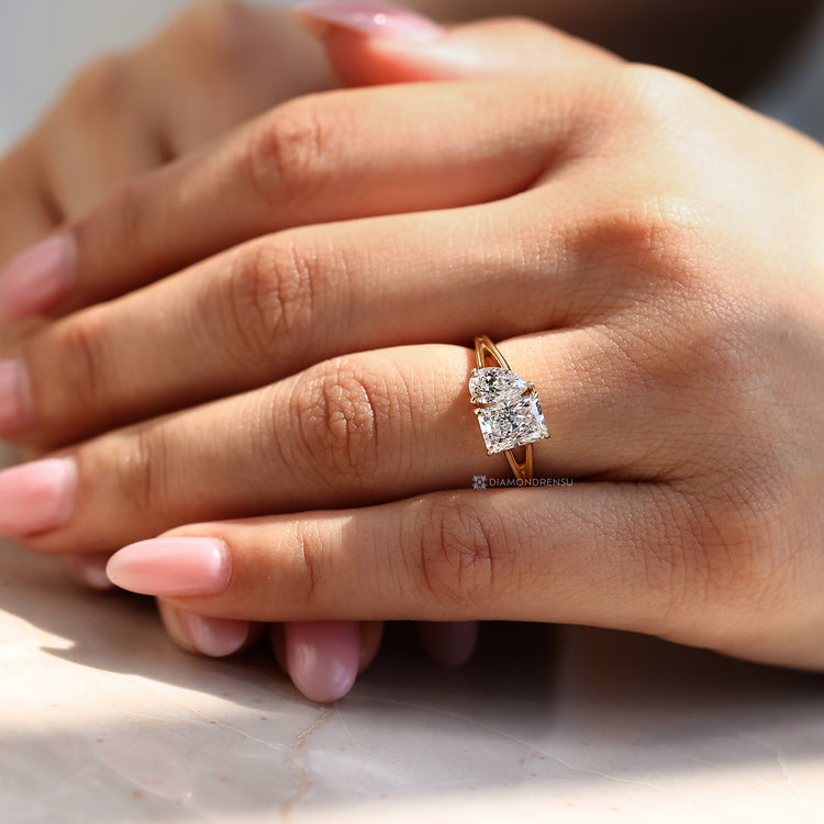The split shank enhances this two stone engagement ring.