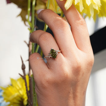Nature inspired green Dutch marquise diamond ring.