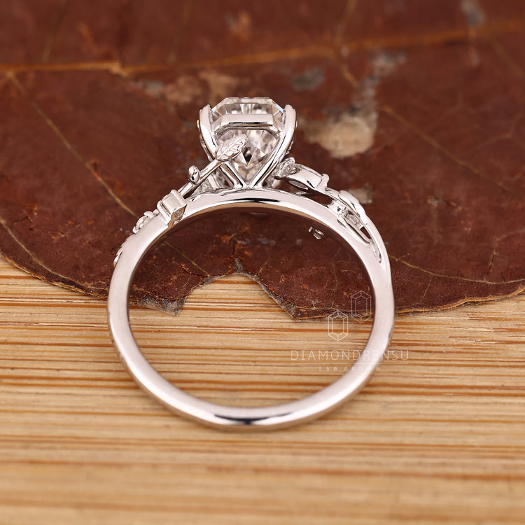 Handmade nature inspired ring with leaf style prongs.