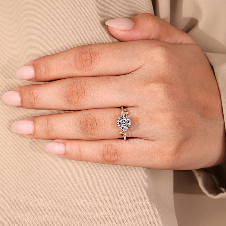 Lab grown diamond ring with round old european cut diamond leaf design.
