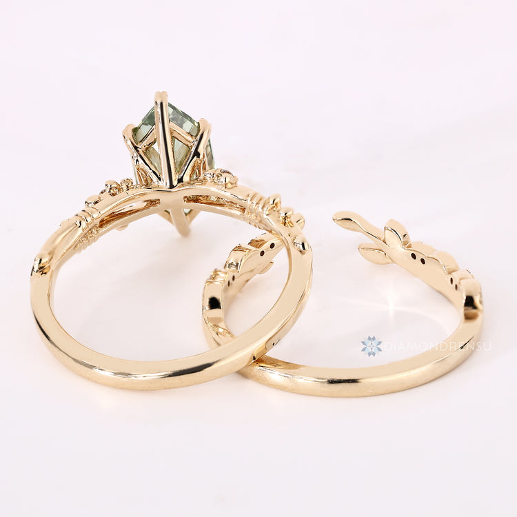 Nature inspired Dutch marquise bridal set with round side stones.