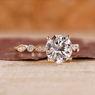 Round diamond ring set in a 4 prong setting.
