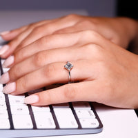 4 prong setting gives a clean, open diamond display.
