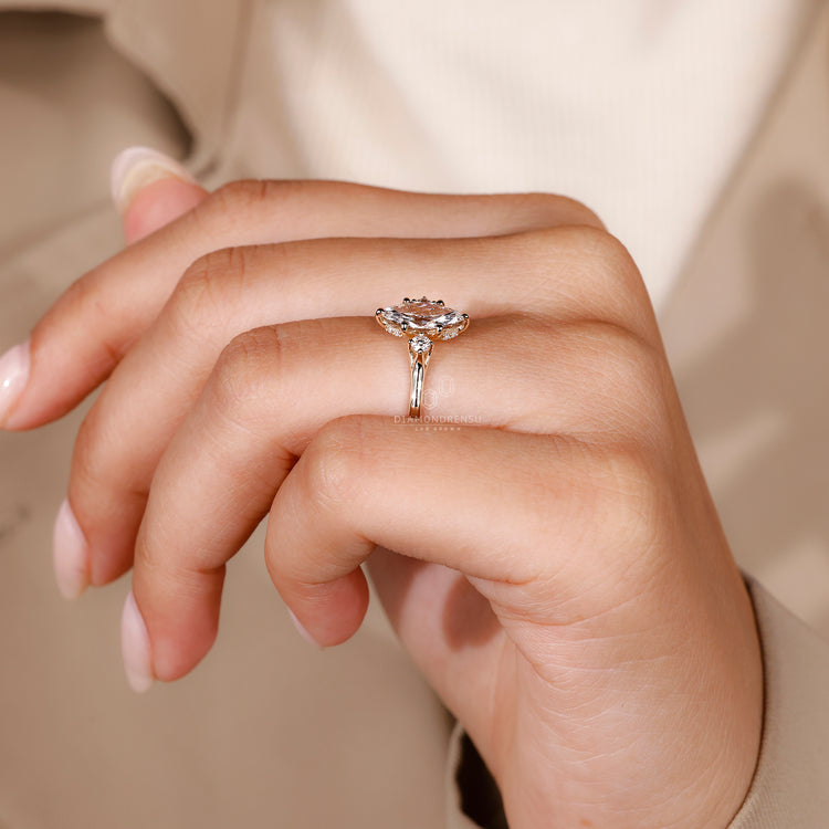 Hidden halo ring featuring a marquise diamond, perfect for couples seeking a unique design with subtle detailing.
