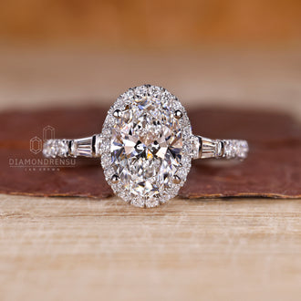 Bridge accent engagement ring with bar setting ring detail.
