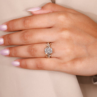 Cluster style engagement ring with radiant lab diamond and nature inspired look
