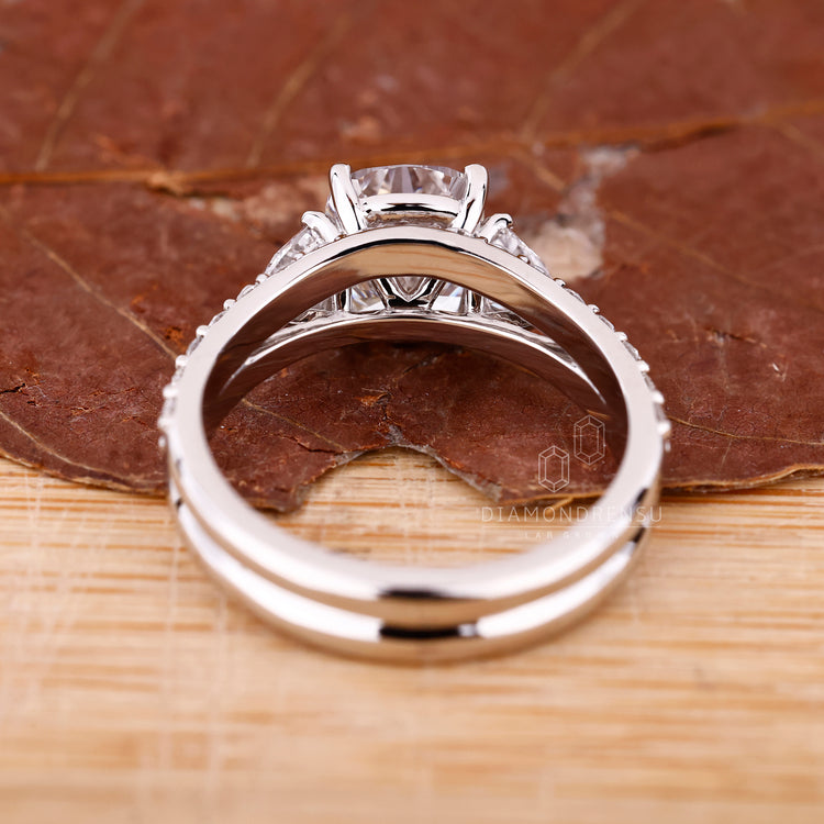 Elegant tapered shank band with handmade jewelry style, perfect for a personalized bridal set.
