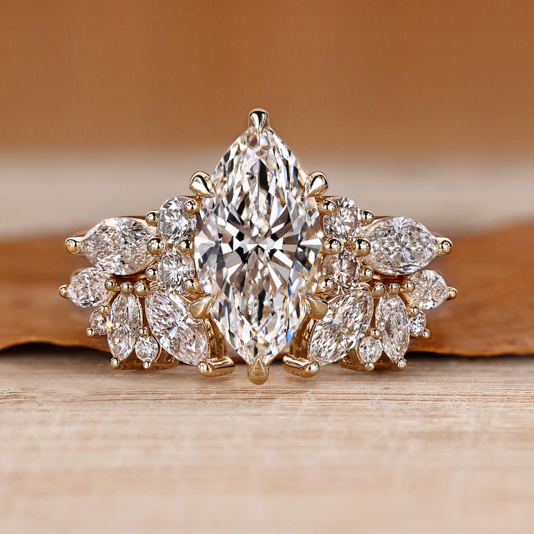 Marquise wedding ring with round and marquise side stones.