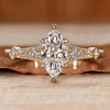 Marquise diamond ring with vintage style and milgrain details.