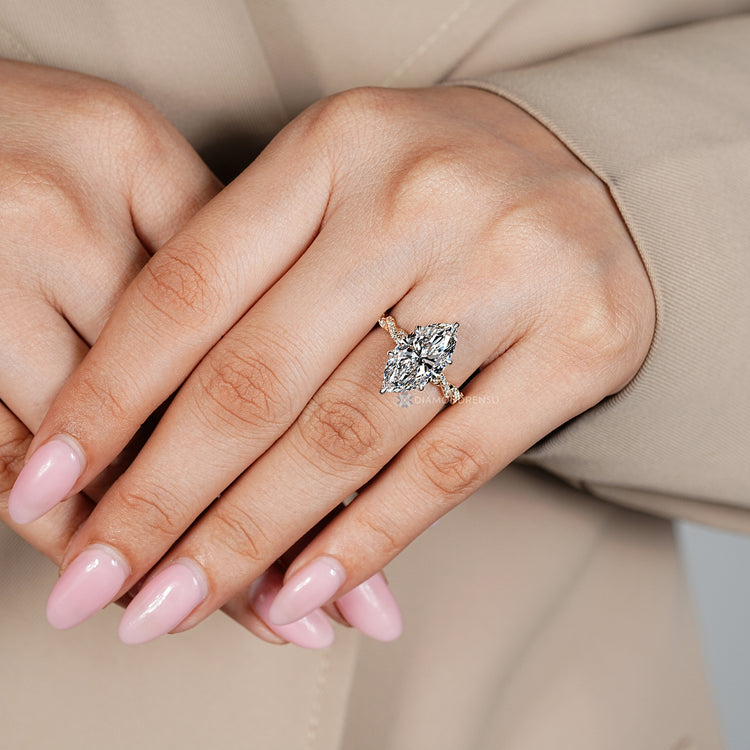 Two tone style pairs with the six claw prong setting.