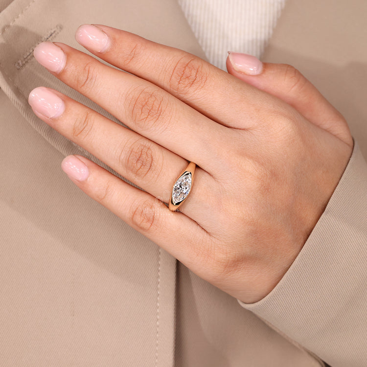 Marquise Cut Engagement Ring in Gypsy Setting