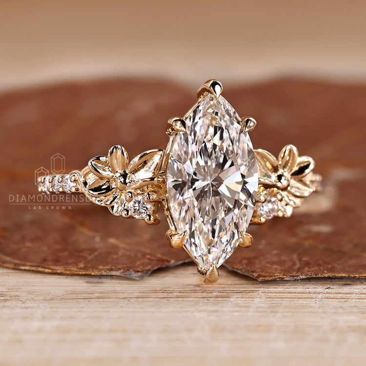 IGI certified marquise ring with floral design and pave band.