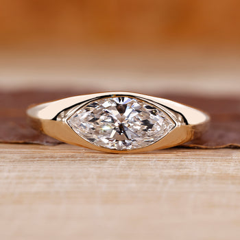 Marquise Cut Engagement Ring in Gypsy Setting