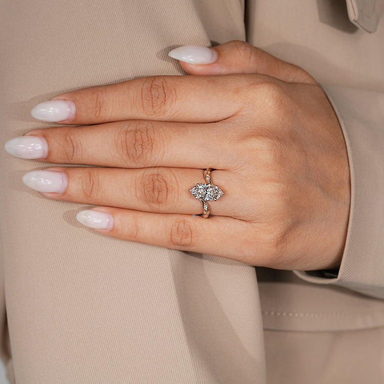 Lab grown marquise engagement ring with a bypass setting.